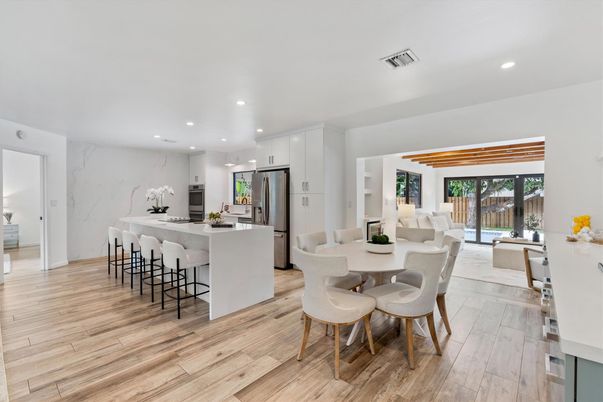 Dining room, Interior, Kitchen, Marble Walls, Recessed Lighting, Stainless Steel Appliances, Wood Texture Flooring