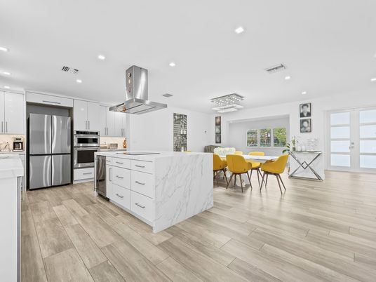 Chandelier, Dining room, Interior, Kitchen, Recessed Lighting, Stainless Steel Appliances, Wood Texture Flooring