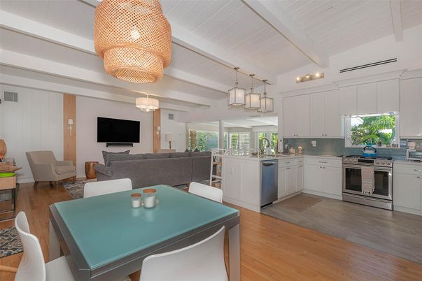 Chandelier, Dining room, Interior, Kitchen, Living room, Stainless Steel Appliances, Wood Texture Flooring