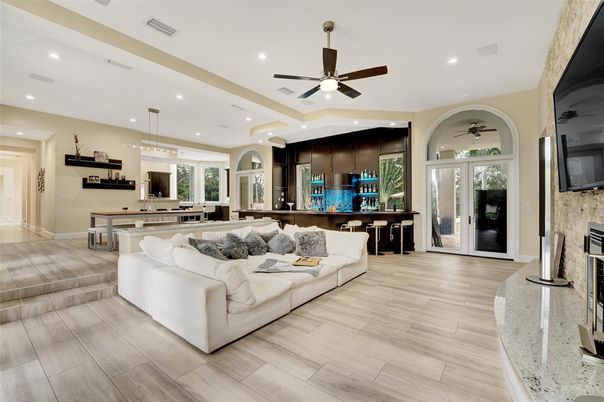 Fireplace, Interior, Living room, Pendant Lights, Recessed Lighting, Stone Walls, Wood Texture Flooring