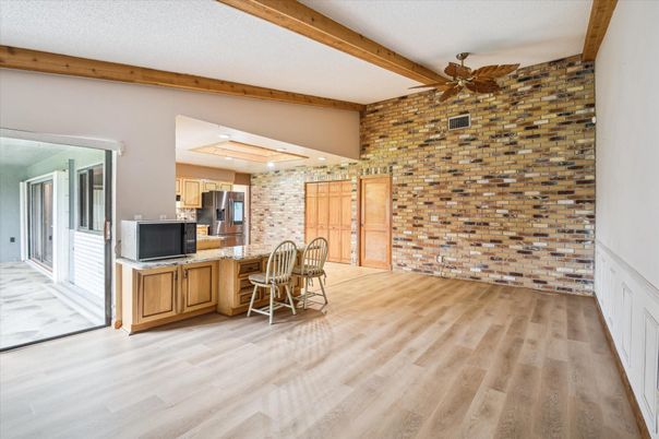 Empty room, Interior, Kitchen, Recessed Lighting, Stone Walls, Wooden Beams, Wood Texture Flooring