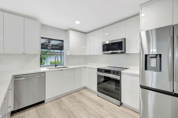 Interior, Kitchen, Recessed Lighting, Stainless Steel Appliances, Wood Texture Flooring