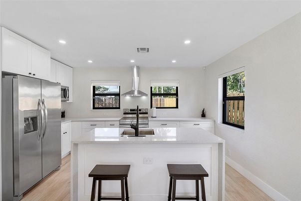 Interior, Kitchen, Recessed Lighting, Stainless Steel Appliances, Wood Texture Flooring