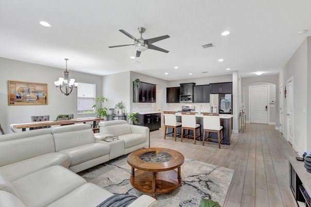 Chandelier, Dining room, Interior, Kitchen, Living room, Recessed Lighting, Stainless Steel Appliances, Wood Texture Flooring