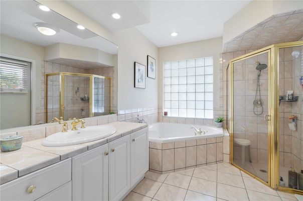 Bathroom, Dual Sink Vanities, Glass Shower, Interior, Recessed Lighting, Tile Countertops