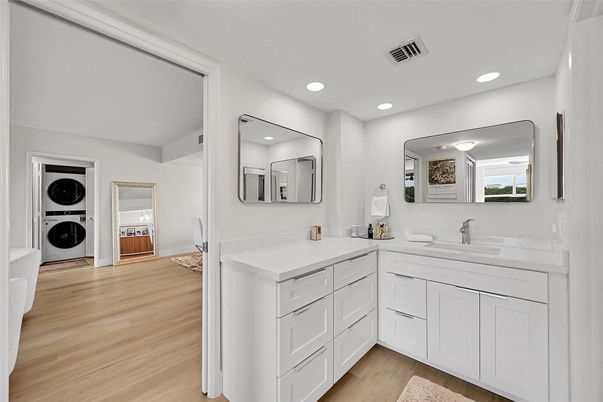 Bathroom, Dual Sink Vanities, Interior, Recessed Lighting, Wood Texture Flooring