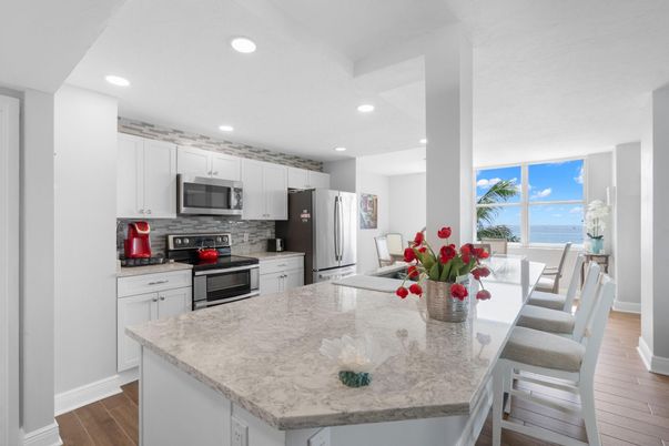 Dining room, Interior, Kitchen, Recessed Lighting, Stainless Steel Appliances, Water, Wood Texture Flooring