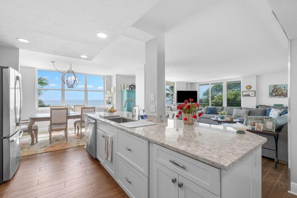 Chandelier, Dining room, Interior, Kitchen, Living room, Recessed Lighting, Water, Wood Texture Flooring