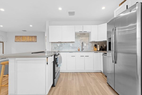 Interior, Kitchen, Recessed Lighting, Stainless Steel Appliances, Wood Texture Flooring
