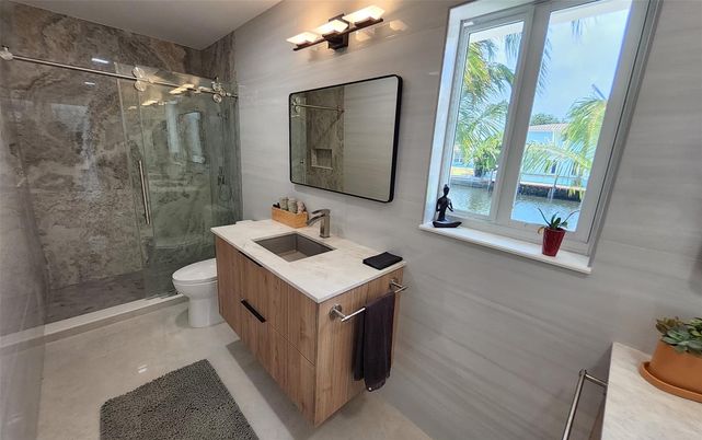 Bathroom, Dual Sink Vanities, Glass Shower, Interior, Marble Walls