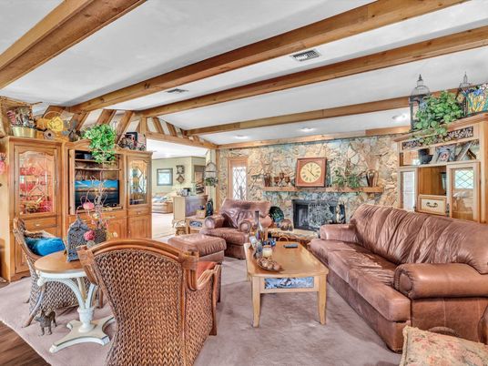 Dining room, Fireplace, Interior, Living room, Recessed Lighting, Stone Walls, Wooden Beams