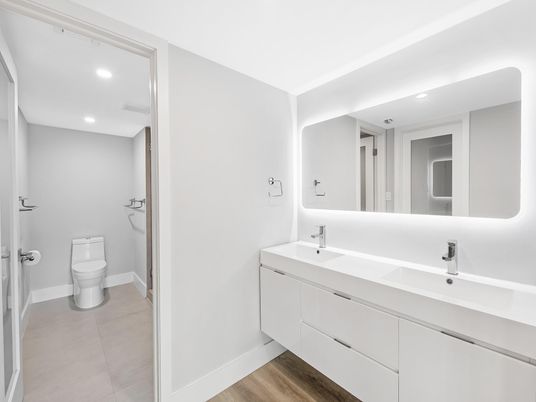 Bathroom, Dual Sink Vanities, Interior, Recessed Lighting, Wood Texture Flooring