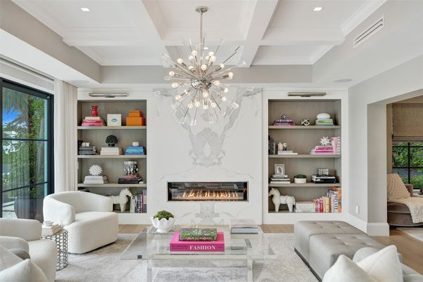 Fireplace, Interior, Living room, Marble Walls, Pendant Lights, Recessed Lighting, Wood Texture Flooring
