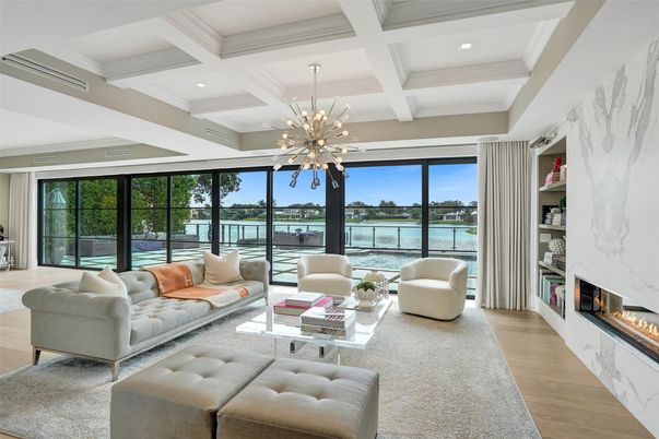 Fireplace, Interior, Living room, Pendant Lights, Recessed Lighting, Water, Wood Texture Flooring