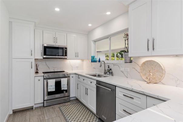 Interior, Kitchen, Recessed Lighting, Stainless Steel Appliances, Wood Texture Flooring