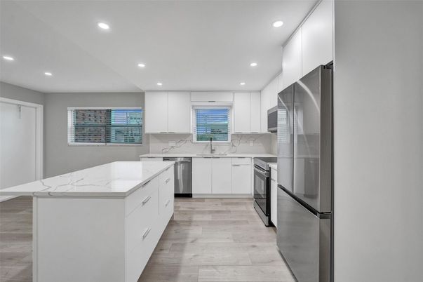 Interior, Kitchen, Recessed Lighting, Stainless Steel Appliances, Wood Texture Flooring