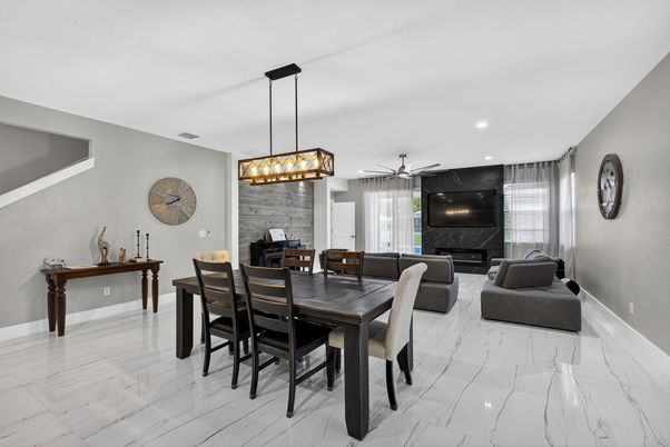 Dining room, Fireplace, Interior, Living room, Marble, Pendant Lights, Recessed Lighting