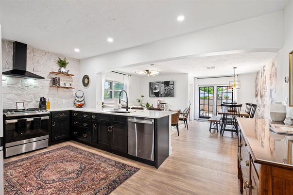 Dining room, Interior, Kitchen, Pendant Lights, Recessed Lighting, Stainless Steel Appliances, Wood Texture Flooring