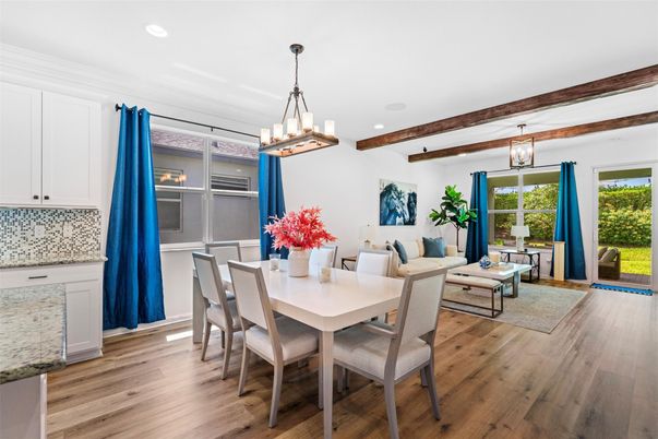 Chandelier, Dining room, Interior, Living room, Pendant Lights, Recessed Lighting, Wooden Beams, Wood Texture Flooring