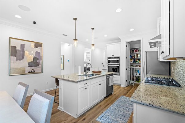 Interior, Kitchen, Pendant Lights, Recessed Lighting, Stainless Steel Appliances, Wood Texture Flooring