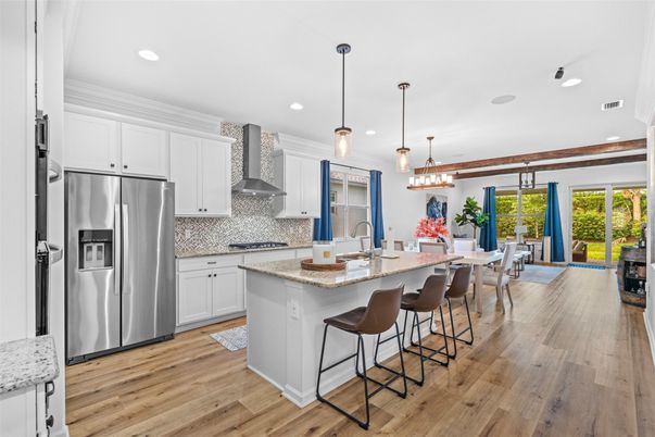 Dining room, Interior, Kitchen, Pendant Lights, Recessed Lighting, Stainless Steel Appliances, Wood Texture Flooring