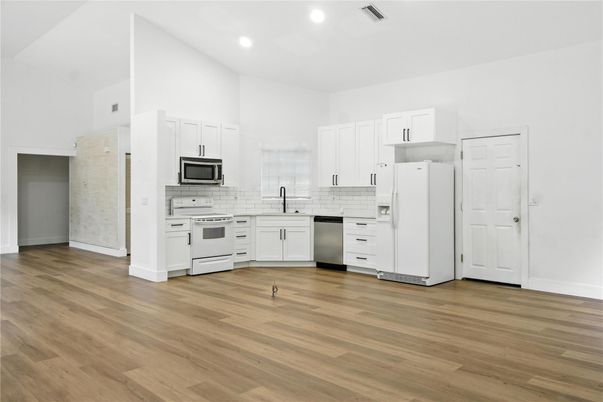 Interior, Kitchen, Recessed Lighting, Stainless Steel Appliances, Wood Texture Flooring