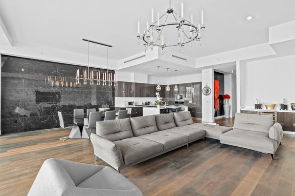 Chandelier, Dining room, Interior, Kitchen, Living room, Marble Walls, Pendant Lights, Recessed Lighting, Stainless Steel Appliances, Wood Texture Flooring