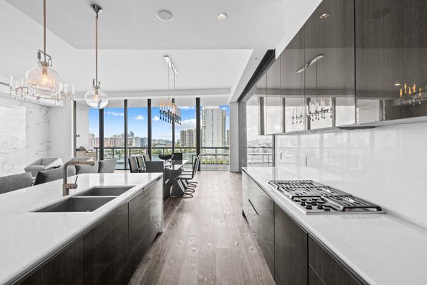 Chandelier, Dining room, Interior, Kitchen, Pendant Lights, Recessed Lighting, Water, Wood Texture Flooring