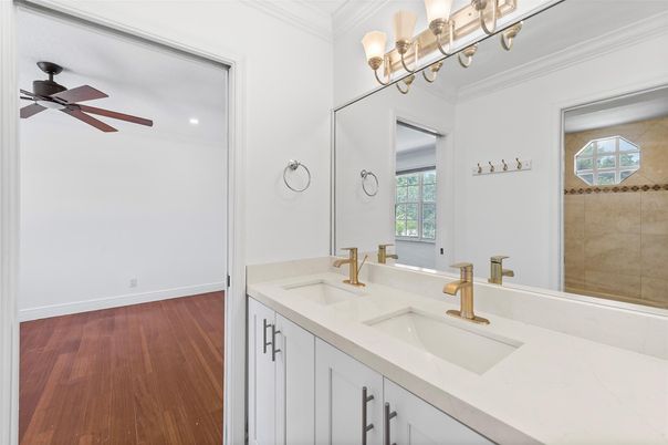 Bathroom, Dual Sink Vanities, Interior, Recessed Lighting, Wood Texture Flooring