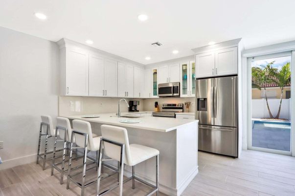 Interior, Kitchen, Recessed Lighting, Stainless Steel Appliances, Wood Texture Flooring
