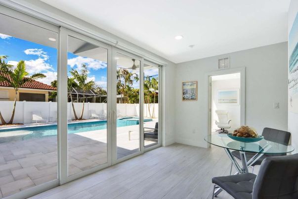 Dining room, Interior, Pool, Recessed Lighting, Wood Texture Flooring