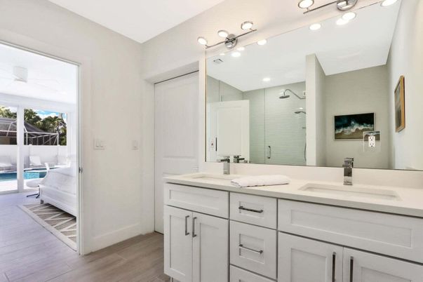 Bathroom, Dual Sink Vanities, Glass Shower, Interior, Wood Texture Flooring