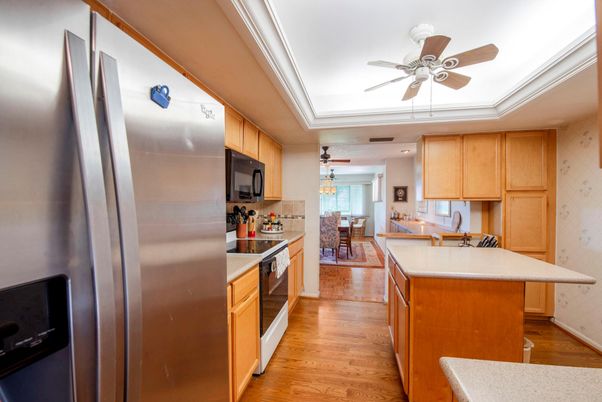Dining room, Interior, Kitchen, Recessed Lighting, Stainless Steel Appliances, Wood Texture Flooring