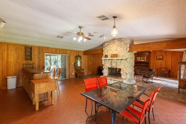 Dining room, Fireplace, Interior, Pendant Lights, Stone Walls, Wooden Walls