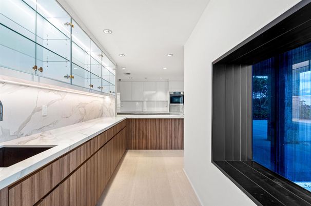 Interior, Kitchen, Marble Walls, Recessed Lighting, Stainless Steel Appliances, Wood Texture Flooring