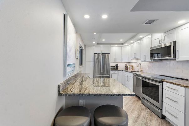 Interior, Kitchen, Recessed Lighting, Stainless Steel Appliances, Wood Texture Flooring