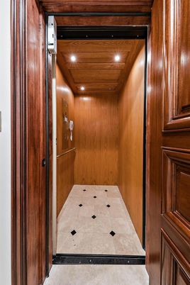 Elevator, Interior, Recessed Lighting, Wooden Ceilings, Wooden Walls