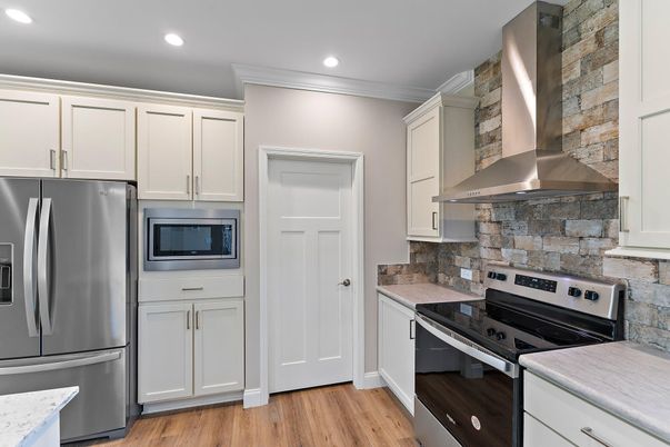 Interior, Kitchen, Recessed Lighting, Stainless Steel Appliances, Stone Walls, Wood Texture Flooring