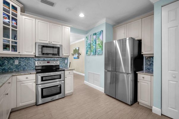 Interior, Kitchen, Recessed Lighting, Stainless Steel Appliances, Wood Texture Flooring