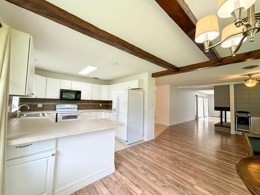 Chandelier, Interior, Kitchen, Tile Countertops, Wooden Beams, Wood Texture Flooring