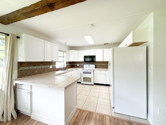 Interior, Kitchen, Tile Countertops, Wooden Beams, Wood Texture Flooring