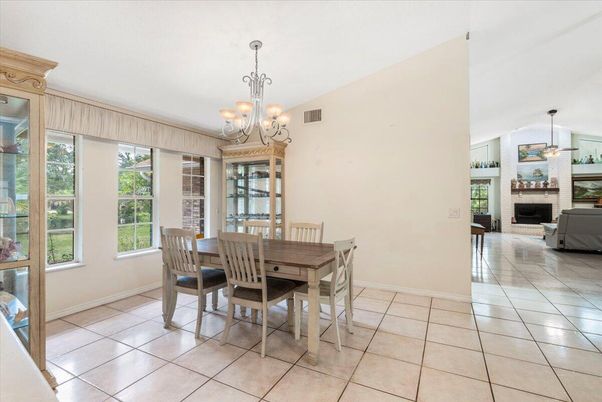 Chandelier, Dining room, Fireplace, Interior, Pendant Lights