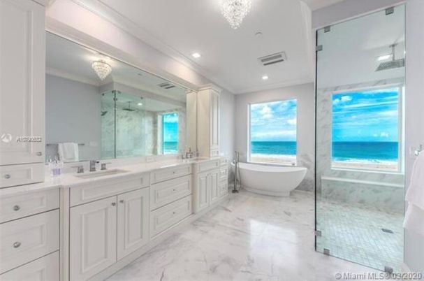 Bathroom, Dual Sink Vanities, Free Standing Baths, Glass Shower, Interior, Marble, Marble Walls, Recessed Lighting, Water