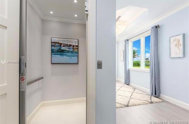 Elevator, Interior, Recessed Lighting, Wood Texture Flooring