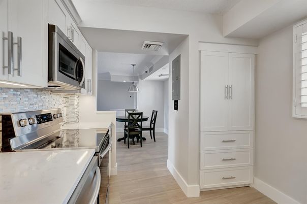 Dining room, Interior, Kitchen, Pendant Lights, Stainless Steel Appliances, Wood Texture Flooring