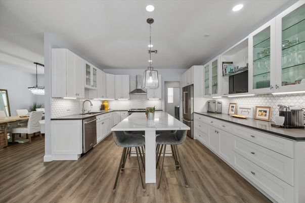Dining room, Interior, Kitchen, Pendant Lights, Recessed Lighting, Stainless Steel Appliances, Wood Texture Flooring
