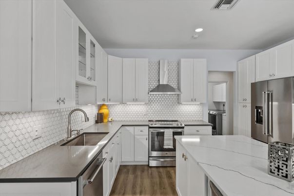 Interior, Kitchen, Recessed Lighting, Stainless Steel Appliances, Wood Texture Flooring