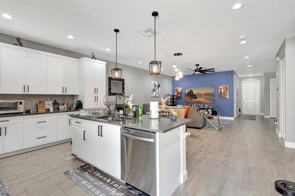 Dining room, Interior, Kitchen, Pendant Lights, Recessed Lighting, Stainless Steel Appliances, Wood Texture Flooring