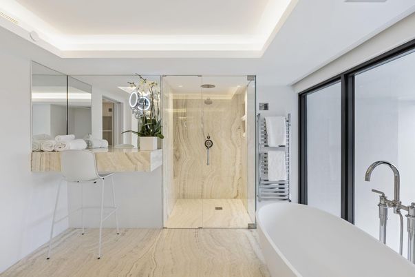 Bathroom, Glass Shower, Interior, Marble Walls, Recessed Lighting, Wood Texture Flooring