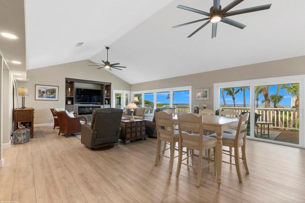 Dining room, Interior, Living room, Recessed Lighting, Water, Wood Texture Flooring